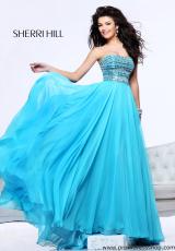 Sherri Hill 1539.  Available in Aqua, Blush, Coral, Emerald, Fuchsia, Ivory/Gold, Light Blue, Nude, Orange, Pink, Purple, Royal, Turquoise, Yellow