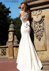 Tarik Ediz 92092.  Available in Emerald, Ivory, Navy, Powder, Red